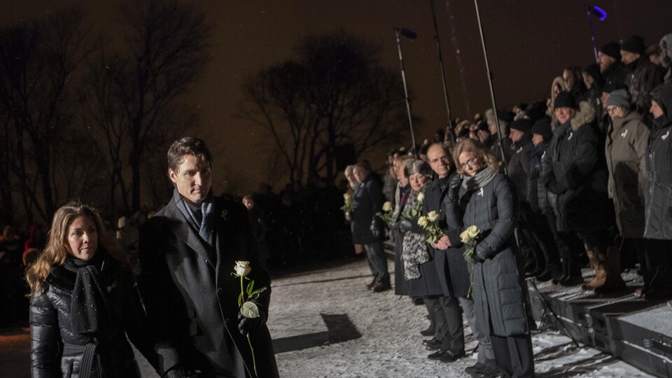 Justin Trudeau et son épouse, lors d'une commémoration de la tuerie de Polytechnique en 2019.