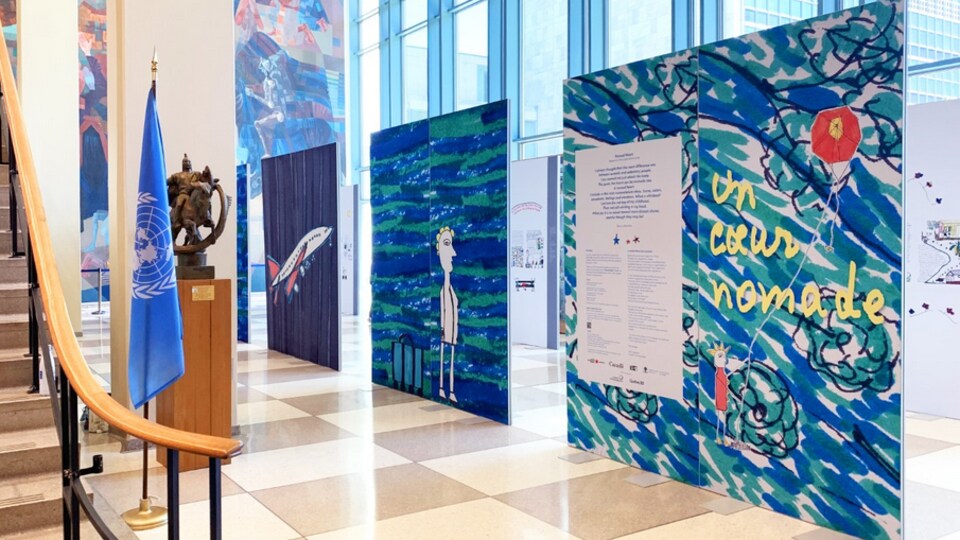 Three giant format drawings are displayed in the entrance hall of the UN building.