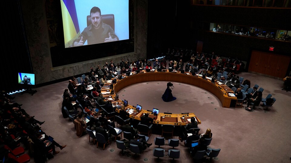 Volodymyr Zelensky appears on a screen in front of the UN Security Council.