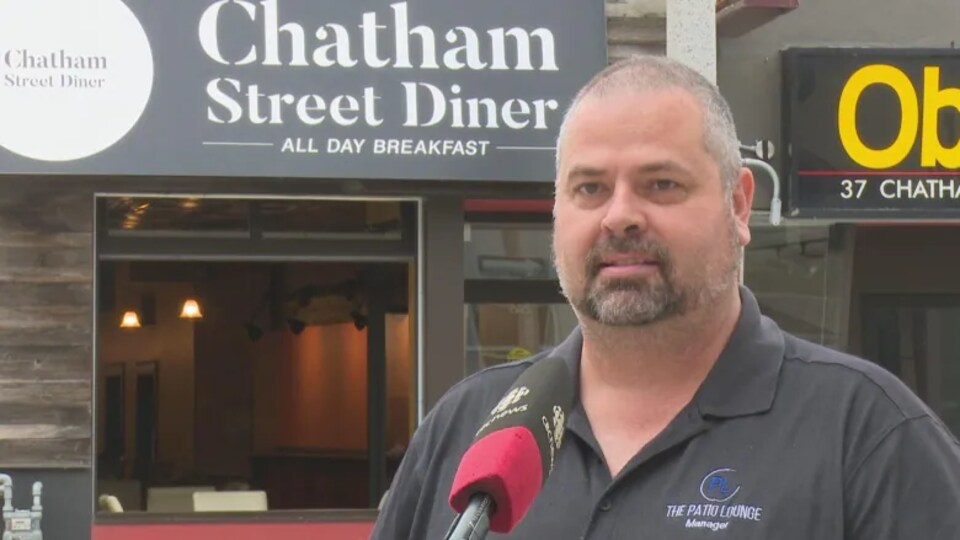 Wade Griffith in front of a business compound.