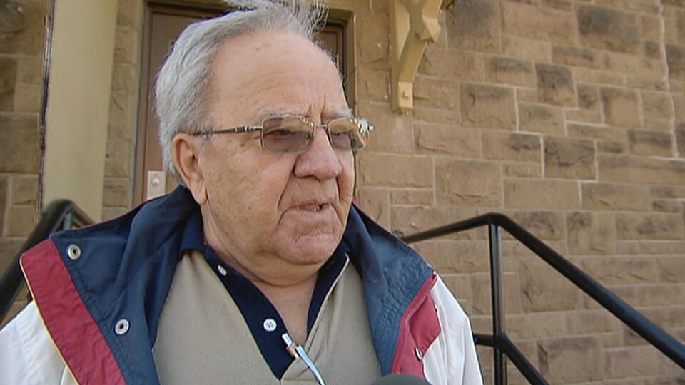 Yvon Cormier was interviewed near a church 