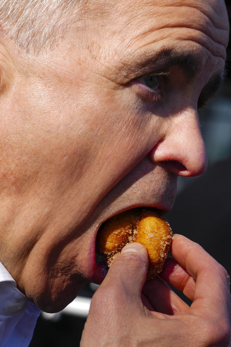 Liberal Leader Mark Carney eats a donut arsenic  helium  makes a whistle halt  astatine  to the White Rock Promenade successful  White Rock, B.C., connected  Wednesday, April 23, 2025. THE CANADIAN PRESS/Sean Kilpatrick