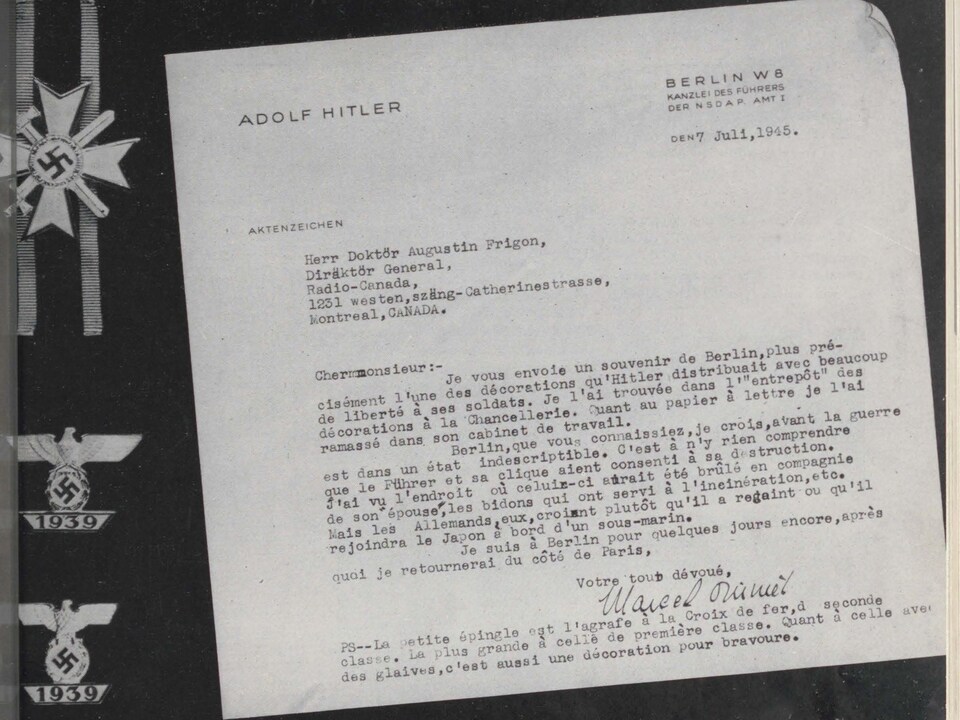 Lettre de Marcel Ouimet dactylographiée sur du papier à lettres du Führer et accompagnée de décorations militaires nazies.