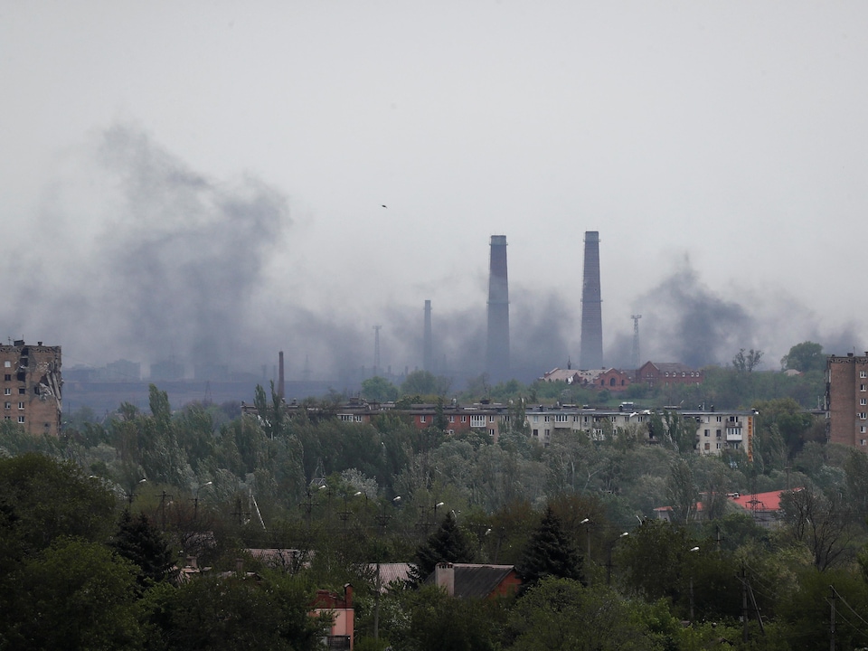 Smoke rises above the Azovstal Metallurgical Plant. 