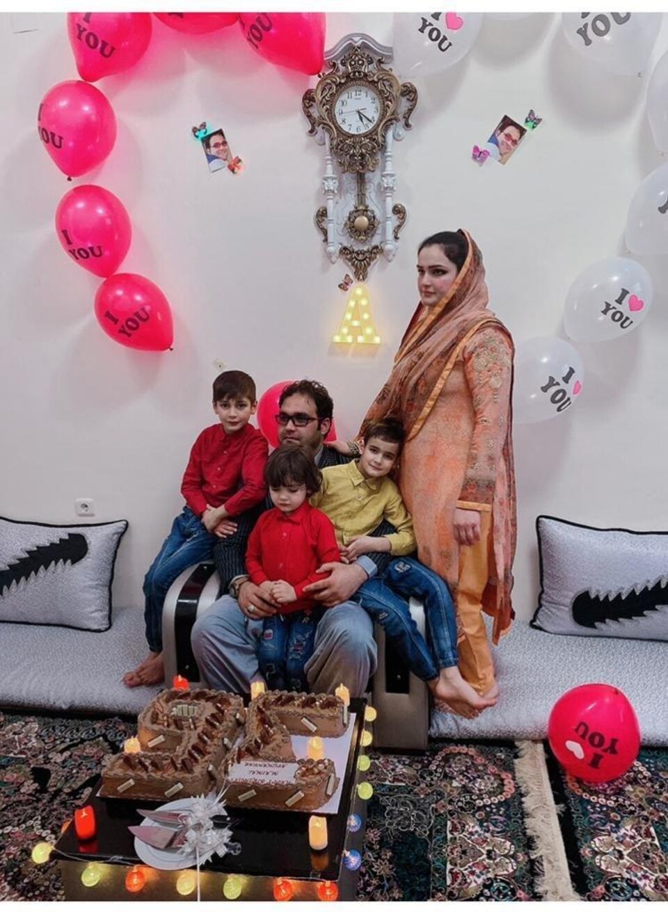 Five people on a couch.