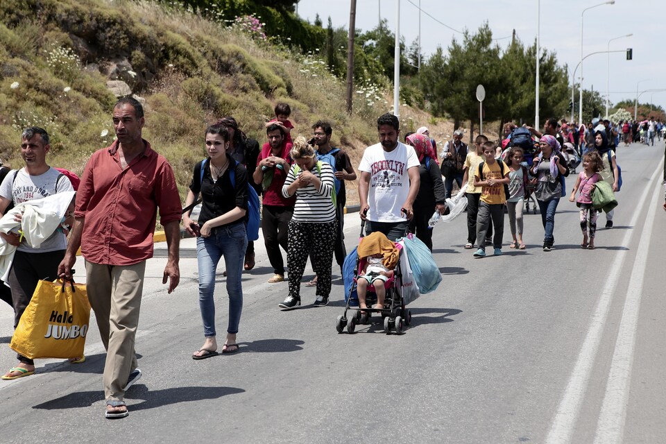 Des demandeurs d'asile sur l’île de Lesbos, en Grèce