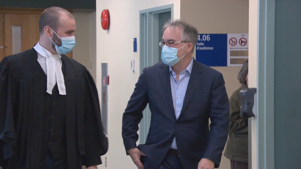 The two men exited the courtroom.