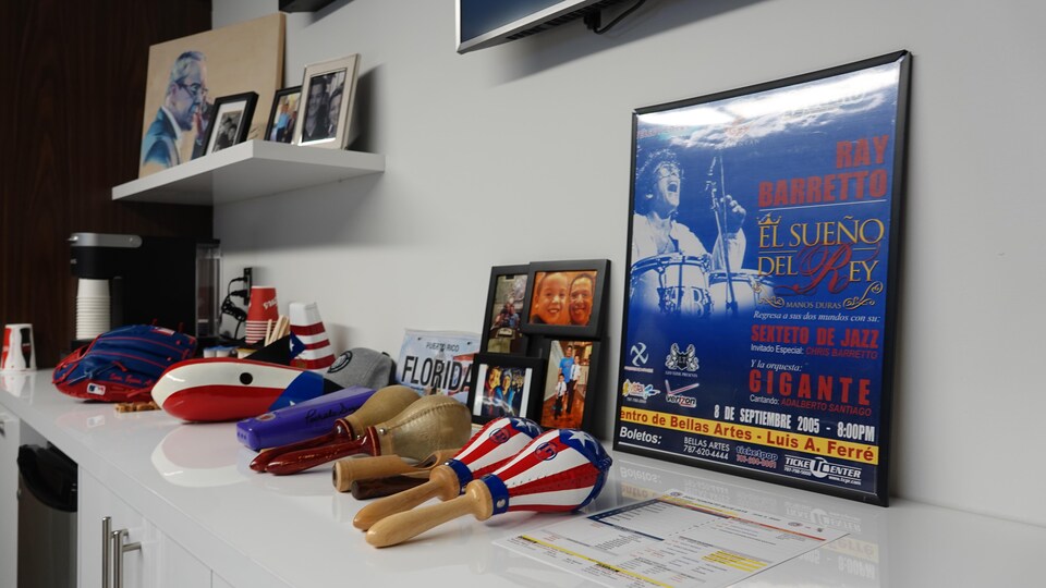 The colors of Puerto Rican and Latin culture are prominent in Charlie Montoyo’s office.