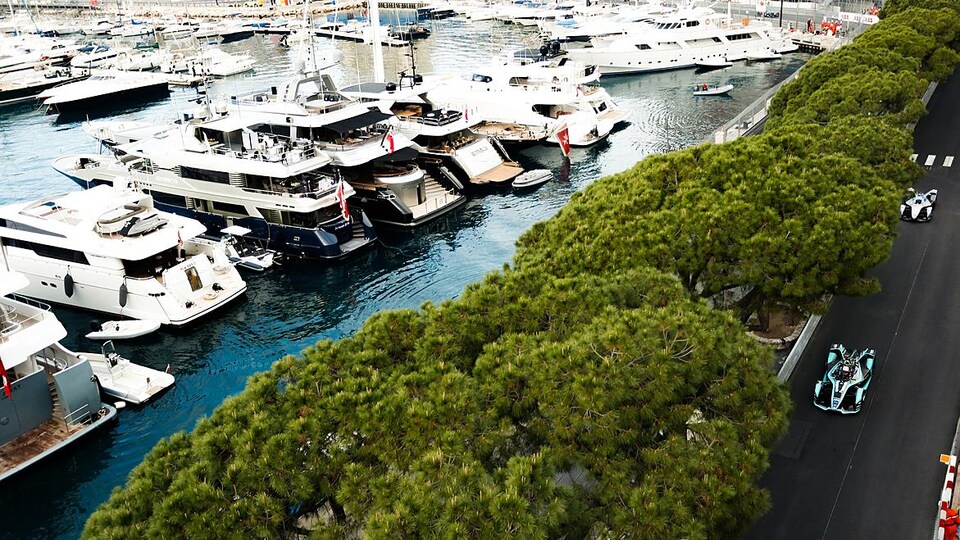 General view of the Circuit de Monaco near the harbor with moored yachts.   