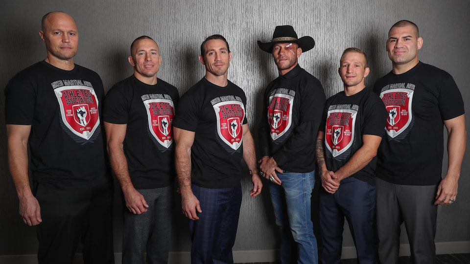 Bjorn Rebney, Georges St-Pierre, Tim Kennedy, Cowboy Cerrone, TJ Dillashaw et Cain Velasquez, membres de l'Association des athlètes d'arts martiaux mixtes