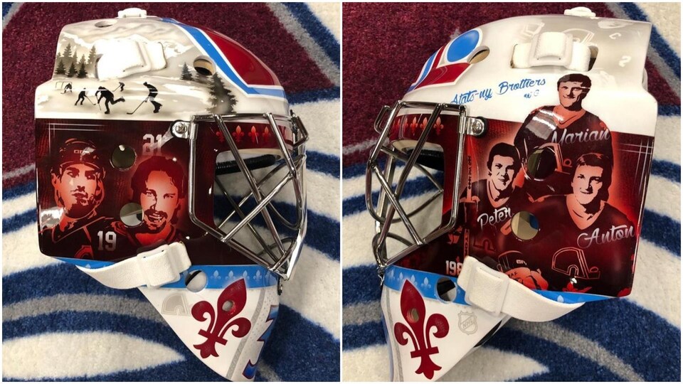 Le masque rend hommage aux Nordiques de Québec en affichant Peter Forsberg, les frères Stastny et Joe Sakic.