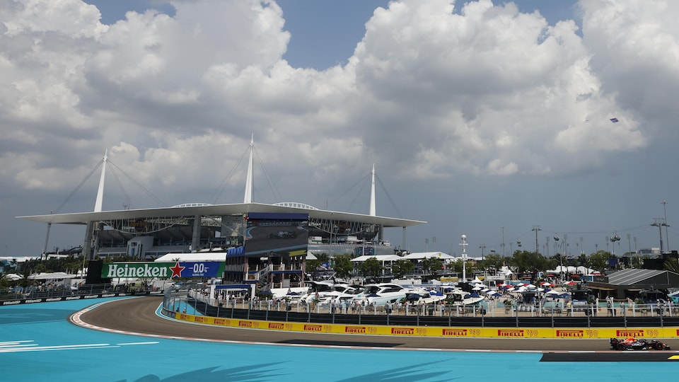 General view of the large curve of the track where the Dolphins football stadium is on the left