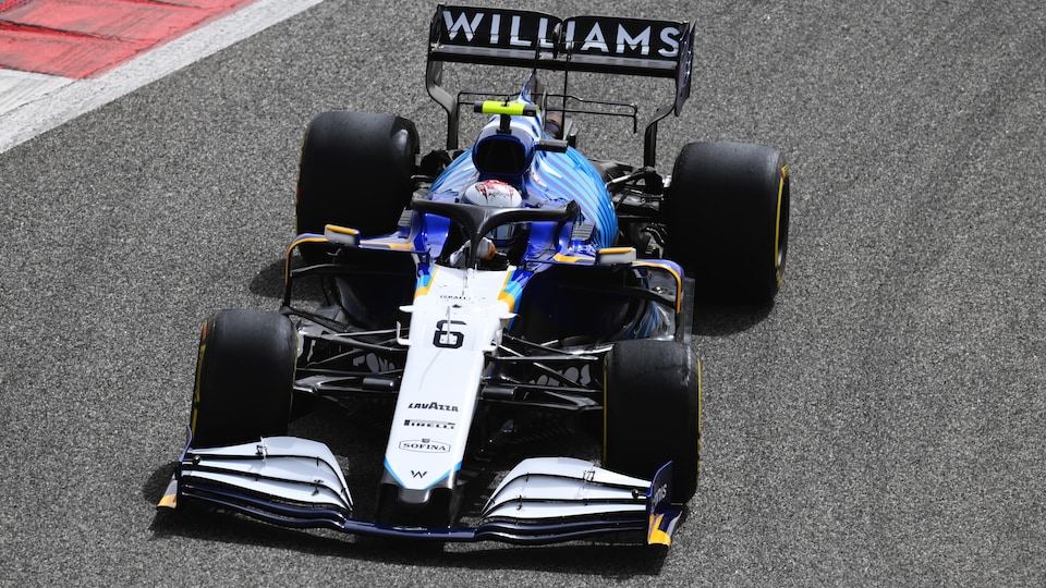 Nicholas Latifi turns left into Williams FW43B