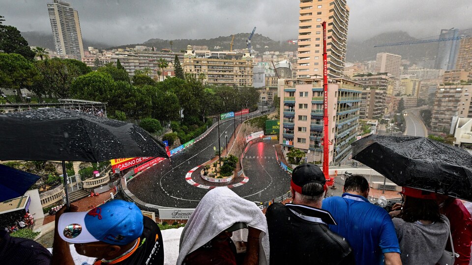 General view of Monaco circuit hairpin with umbrellas in foreground on stands 