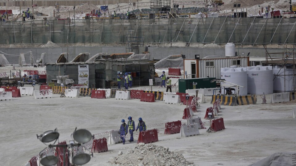 Des travailleurs sur un chantier de construction