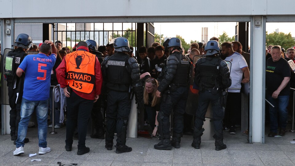 Soccer fans were blocked by a cordon of police.