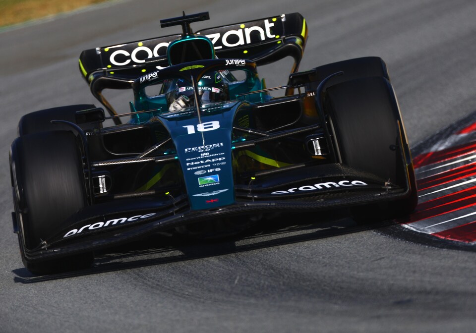 An F1 driver on the left negotiated his single-seater at the top, which bit into the curb.