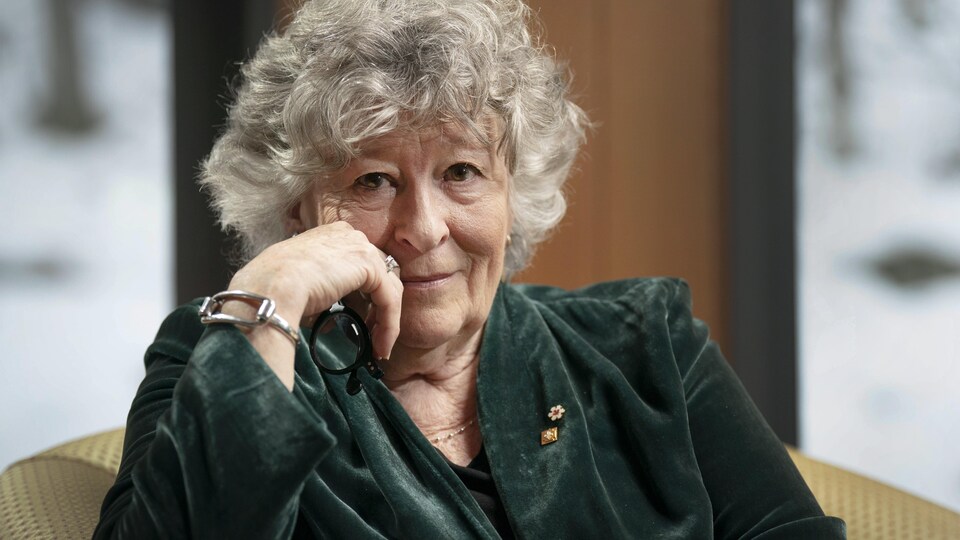 Portrait of Louise Arbour smiling into the camera.