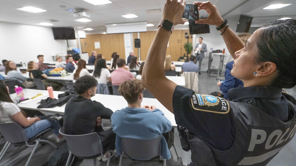 Ingrid Cataldo takes photos of the event.