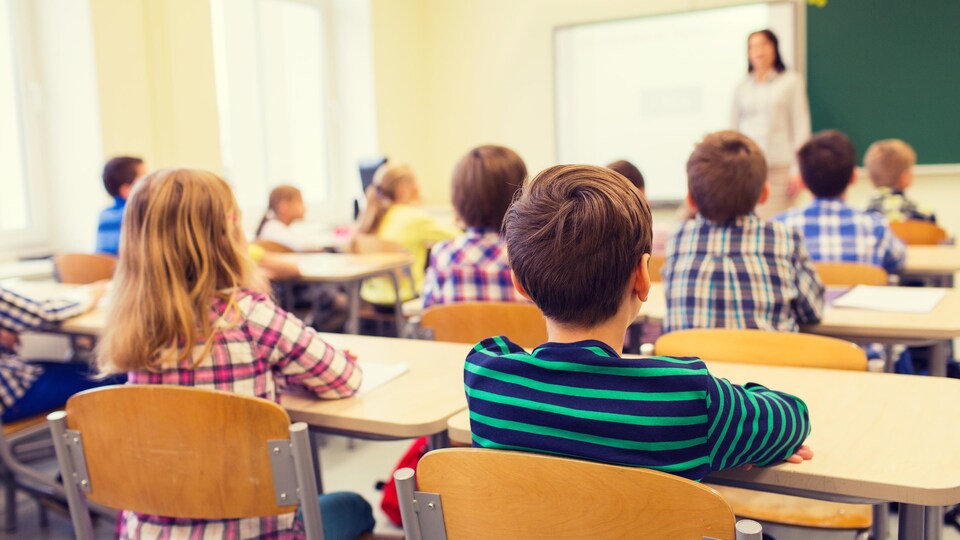 Des élèves en classe.