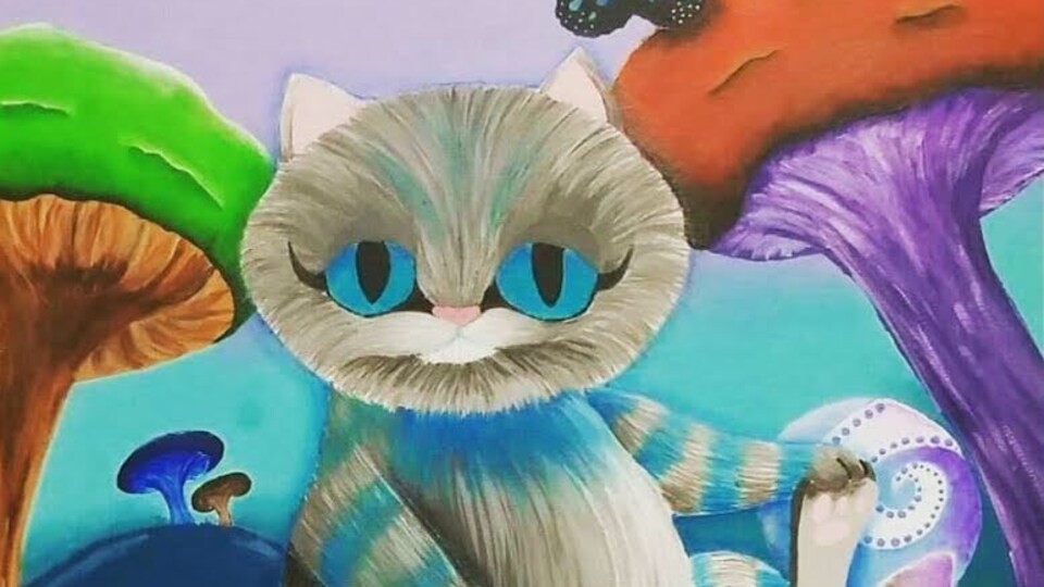 Le dessin d'un chat sur une toile très colorée 
