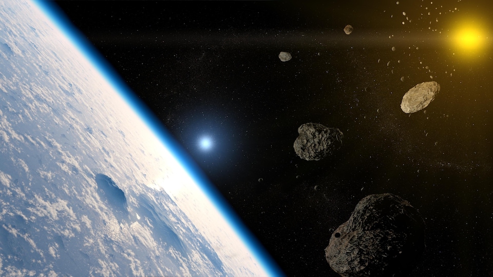 Illustration d'une série d'astéroïdes dans l'espace.
