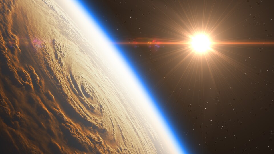 Lever de soleil sur un ouragan, vu de l'espace.