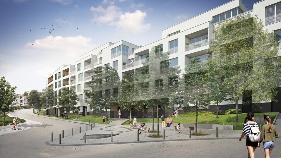 Image d'un long bâtiment blanc de cinq étages.