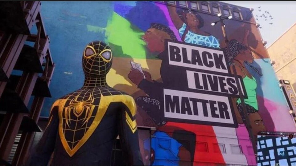 Spider-Man pose devant une murale de Black Lives Matter.