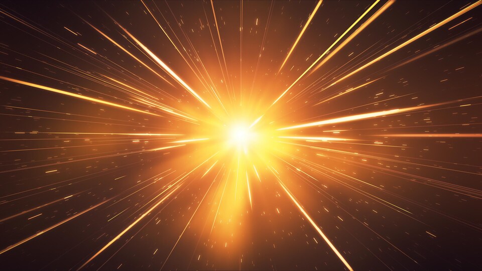 Une explosion se produit dans l'espace, causant de nombreux faisceaux lumineux.