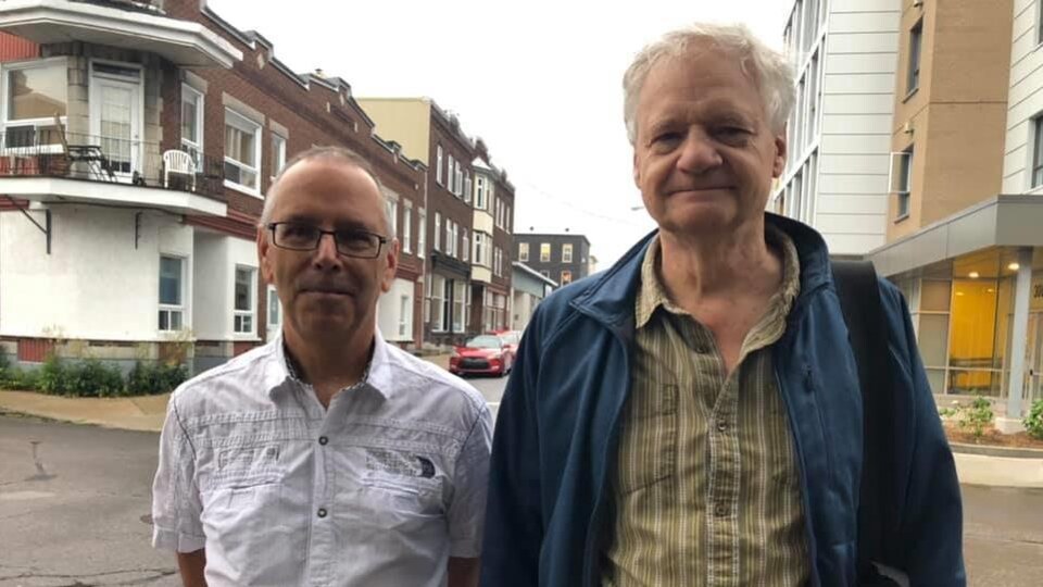 Pierre Duchesne et Pierre Fraser dans le quartier Saint-Sauveur à Québec