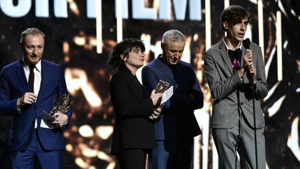 Hugues Charbonneau, Marie-Ange Luciani, Robin Campillo et Rémy Hamai sur la scène de la cérémonie des Césars, le 2 mars.