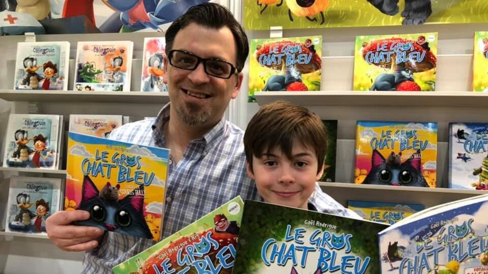 Pierre Rodrigue et son fils Gaël au Salon du Livre de Québec.