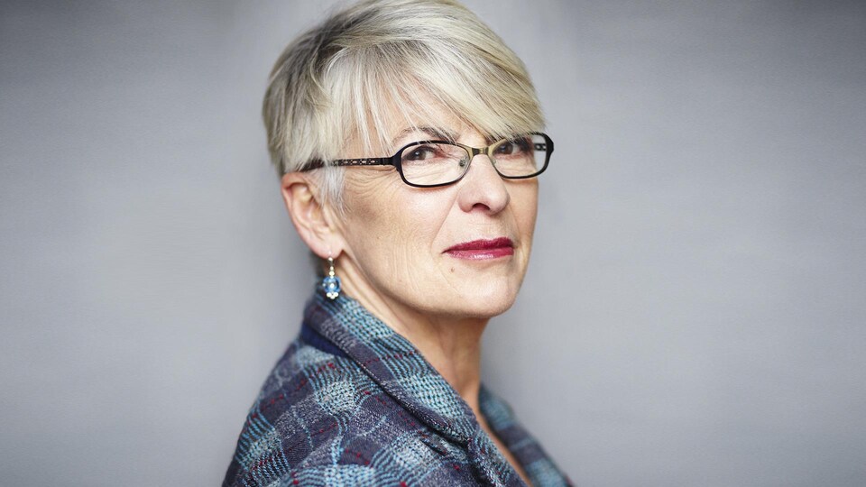 Brigitte Haentjens looking at the camera.