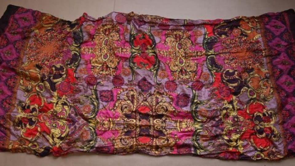 A blanket with a colorful pattern.