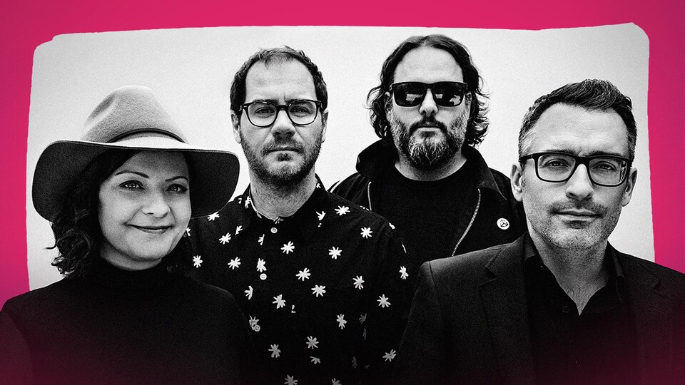 Les membres du groupe Les Cowboys Fringants.