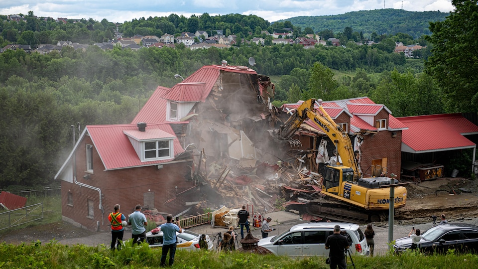 Journalists and police attended the demolition of the Hells bunker. 