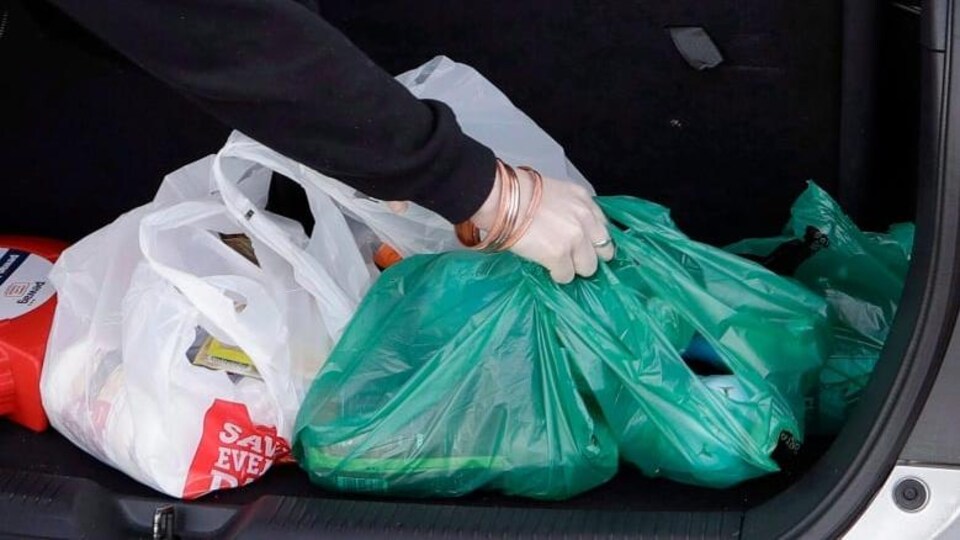 Plastic bags in the trunk of a car.