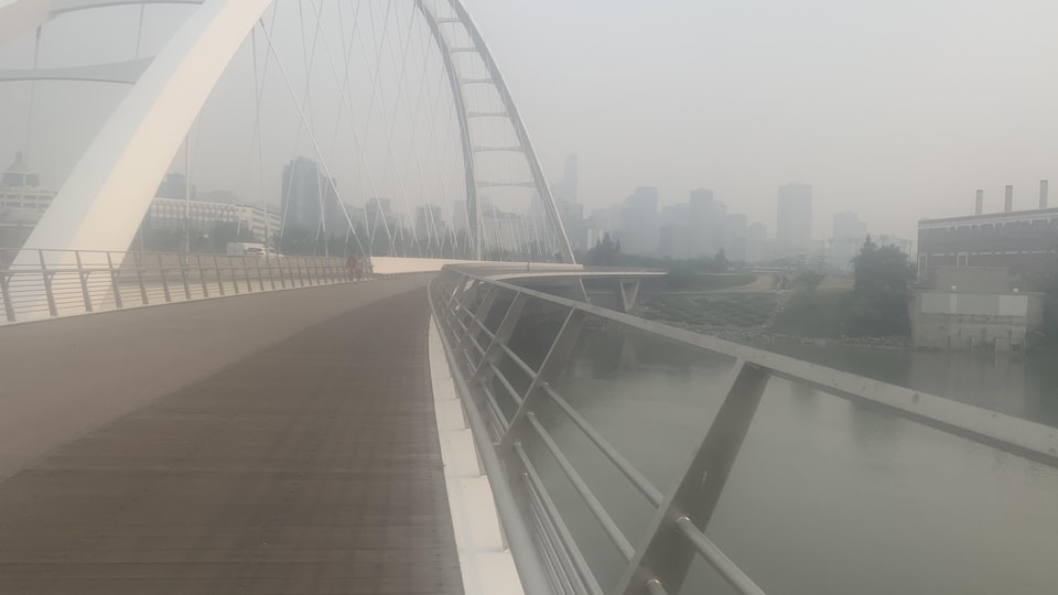 Walterdale Bridge in Edmonton.  The terrain is very dim with smoke.