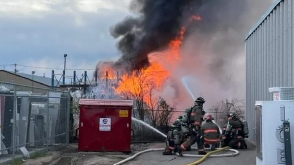 Several firefighters put out a fire with a high flame with lots of black smoke in the yard of a business in Saskatoon.
