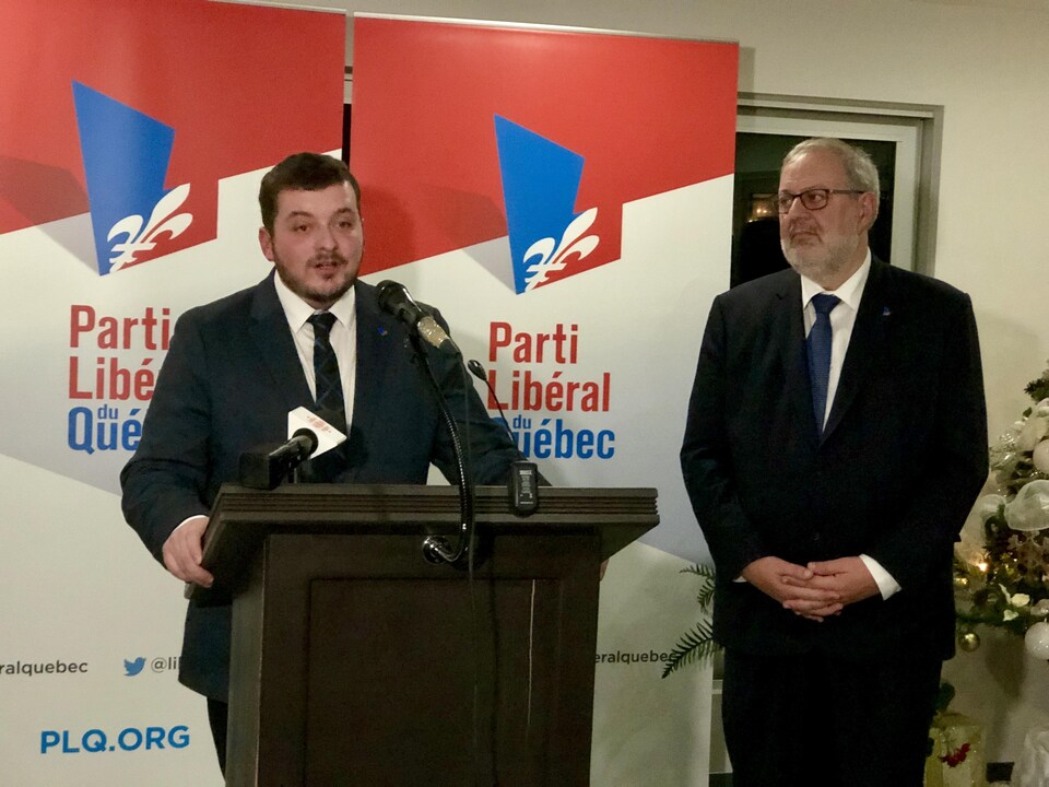 Le candidat défait William Laroche et le chef intérimaire du Parti libéral, Pierre Arcand