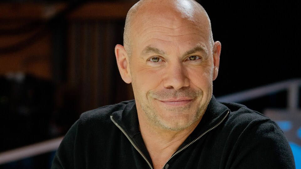 portrait of smiling bald man