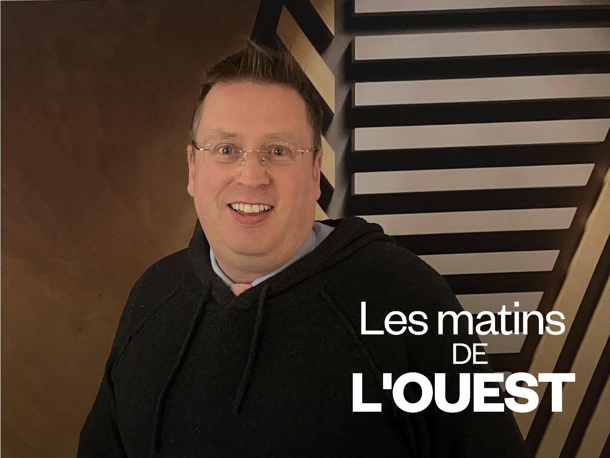 Portrait de Laurent Poliquin qui sourit.