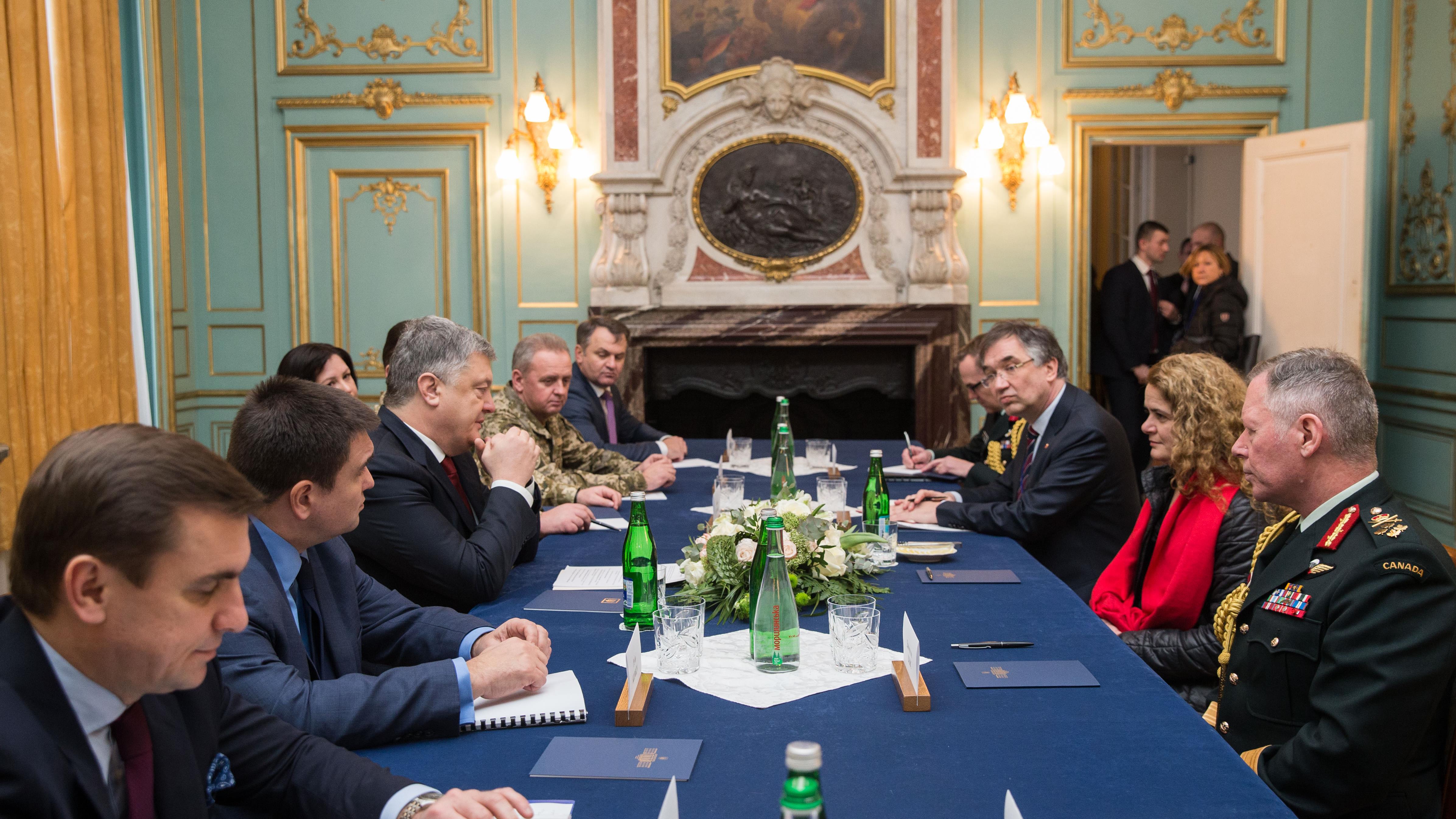 Canadian Gov. Gen. Julie Payette (second right) and Chief of Defence Staff Gen. Jonathan Vance attend a meeting with Ukrainian President Petro Poroshenko (third left) at the Potocki Palace in the western Ukrainian city of Lviv, on Thursday, Jan. 18, 2018. 