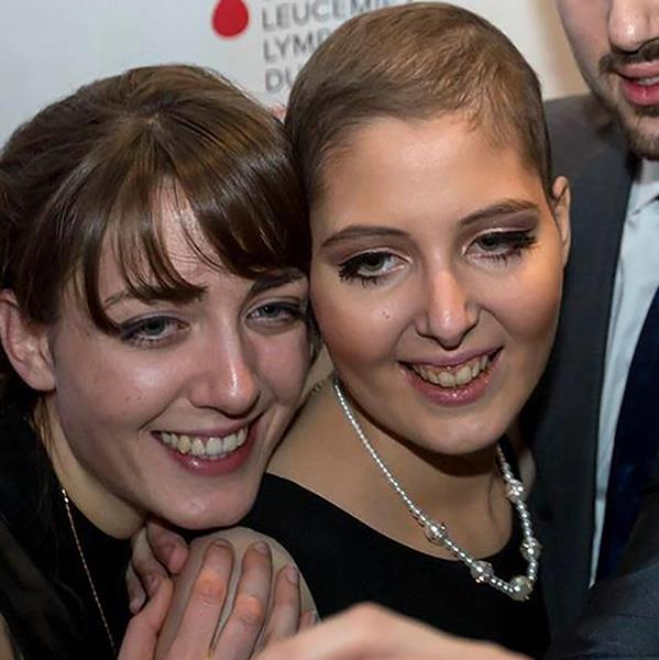 Jenifer et sa famille lors d’une activité de collecte de fonds pour le cancer