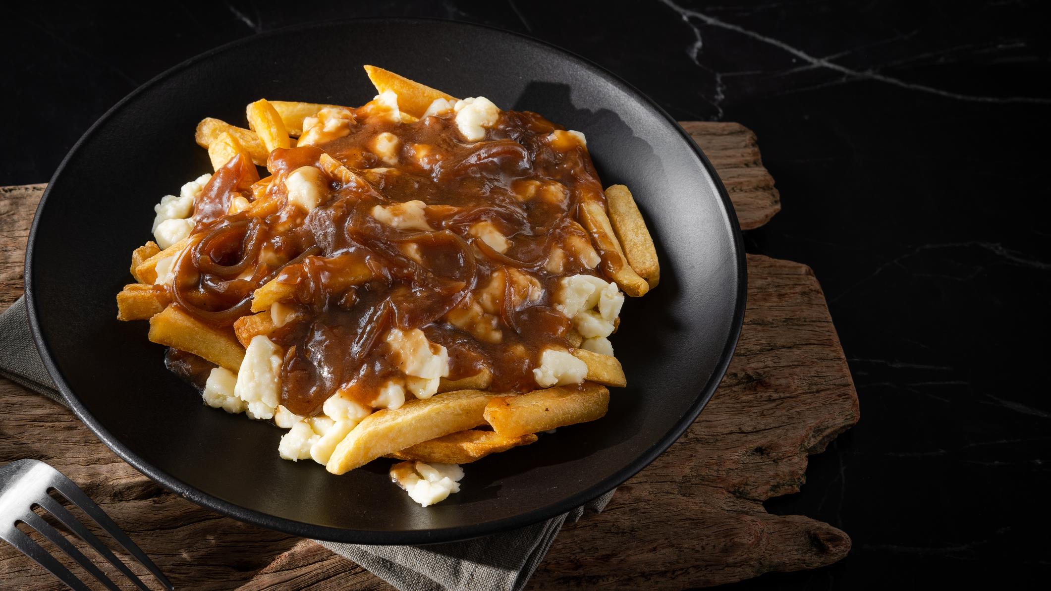 Amos cherche la meilleure poutine en ville