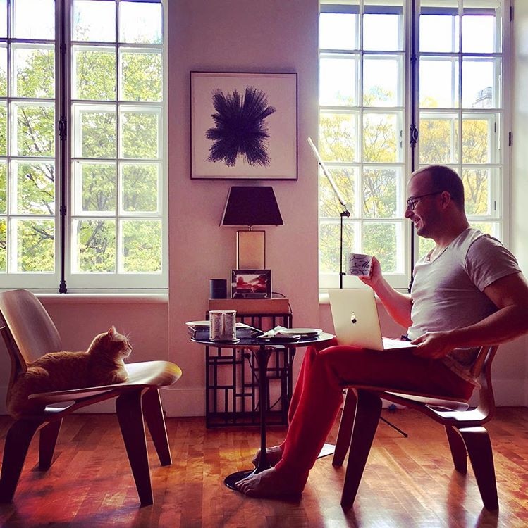 Conductor Yannick Nézet-Séguin enjoys an early morning moment with his cat at his home in Old Montreal.