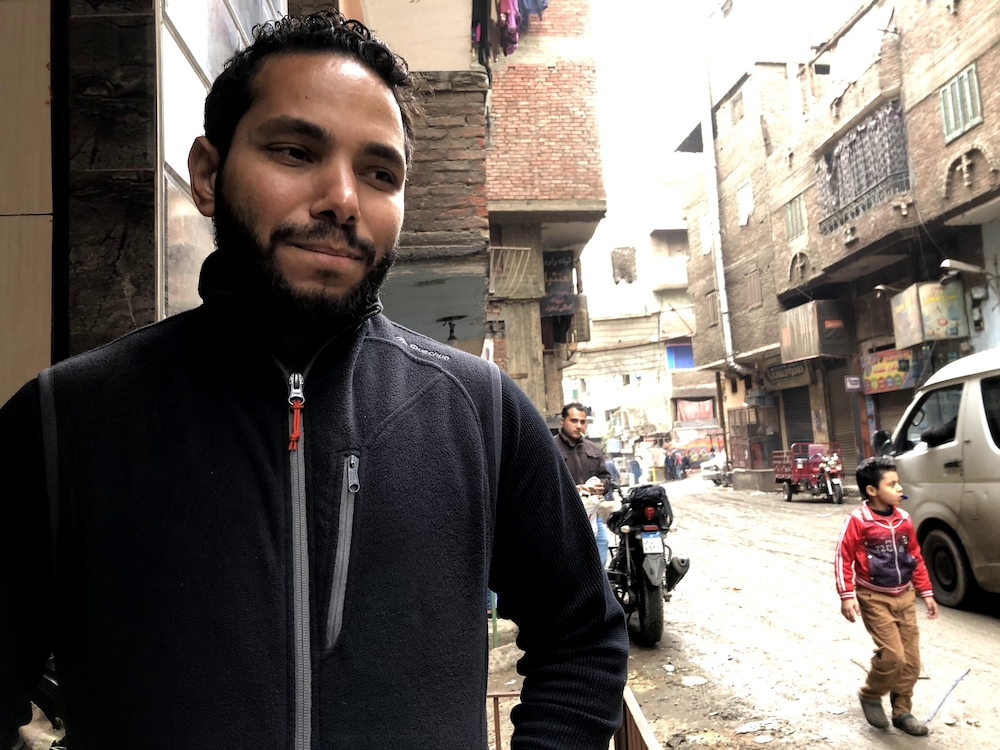 Adham El-Sharkawy, la mine désolée, dans la cité-ordures de Manshiyat Nasser.
