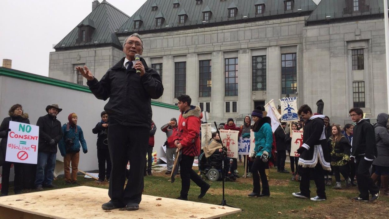 Clyde River mayor James Qillaq addresses a crowd of supporters in Ottawa, thanking them for 'supporting our community and our way of life' in advance of the Nunavut hamlet's Supreme Court hearing Wednesday afternoon. (Waubgeshig Rice/CBC) Clyde River mayor James Qillaq addresses a crowd of supporters in Ottawa, thanking them for 'supporting our community and our way of life' in advance of the Nunavut hamlet's Supreme Court hearing Wednesday afternoon. (Waubgeshig Rice/CBC)