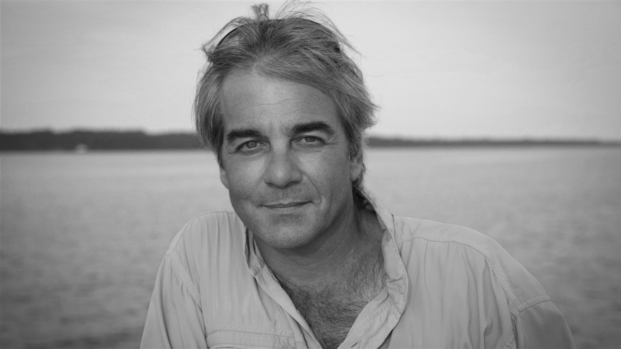 L'environnementaliste Jean Lemire prend la pose, sur une photo en noir et blanc. L'environnementaliste Jean Lemire prend la pose, sur une photo en noir et blanc.